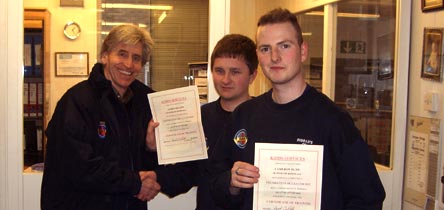 James Todd Wilson and Cameron Rush Dunn receiving their certificates for completing the Removals Foundation Course
