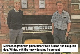 Malcolm Ingram with piano tuner Philip Stokes